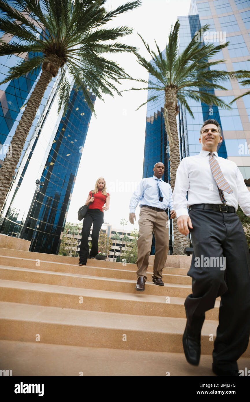 Business people leaving work Stock Photo