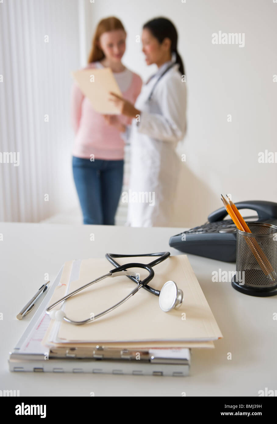 Doctor and patient consultation Stock Photo