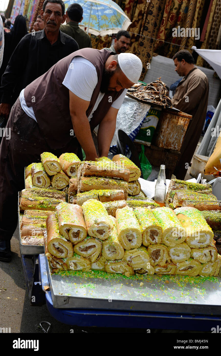 sweet egyptian desserts being sold at souk goma (friday market), Southern Cemeteries, Khalifa