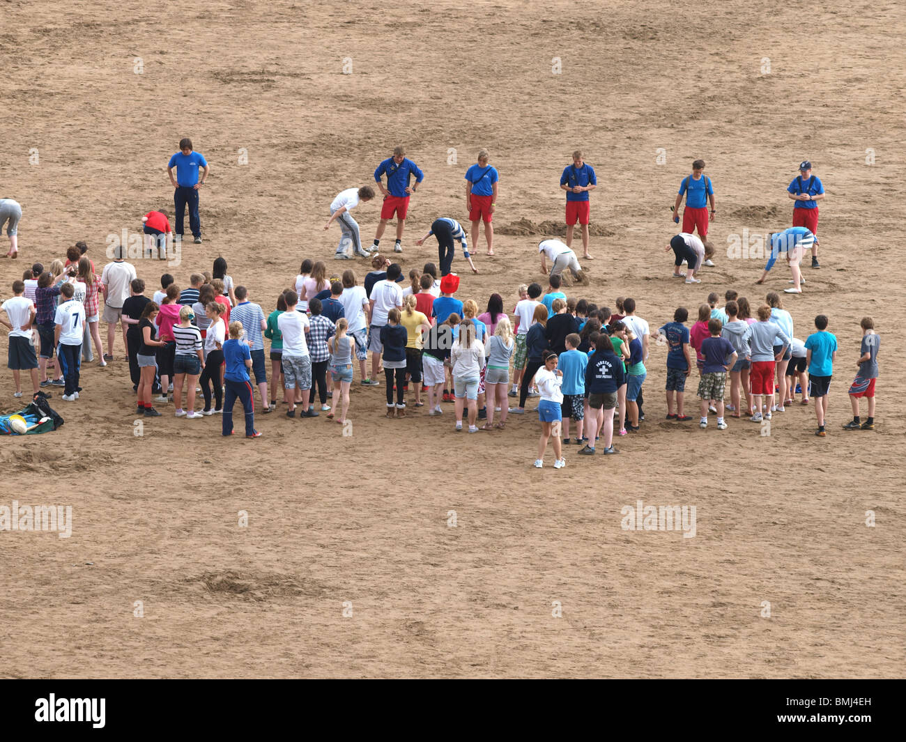 Organized children's sporting event on the beach, Bude, Cornwall Stock Photo