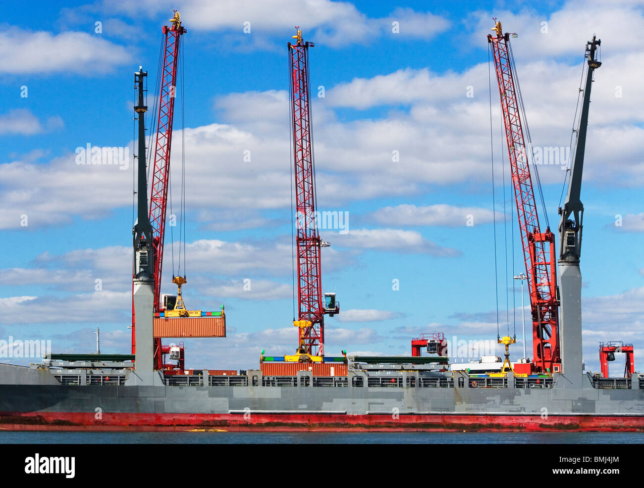 Cranes on cargo ship Stock Photo