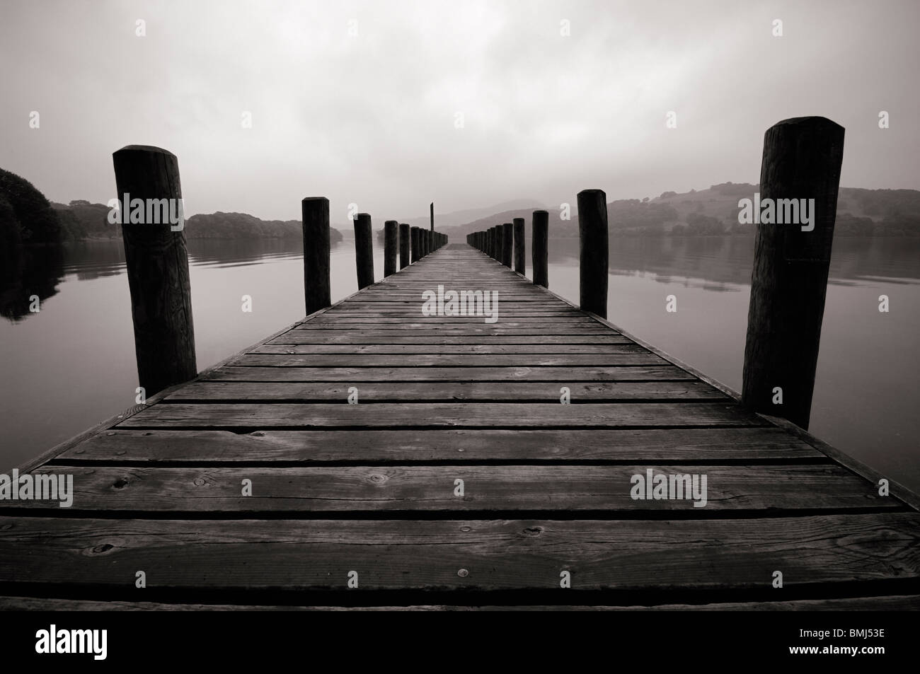 Jetty on Coniston Water in The Lake District National Park Cumbria England Stock Photo