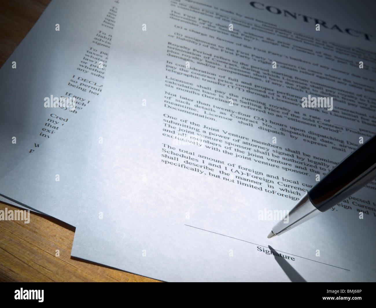Close up of a pen about to sign the contract. Stock Photo