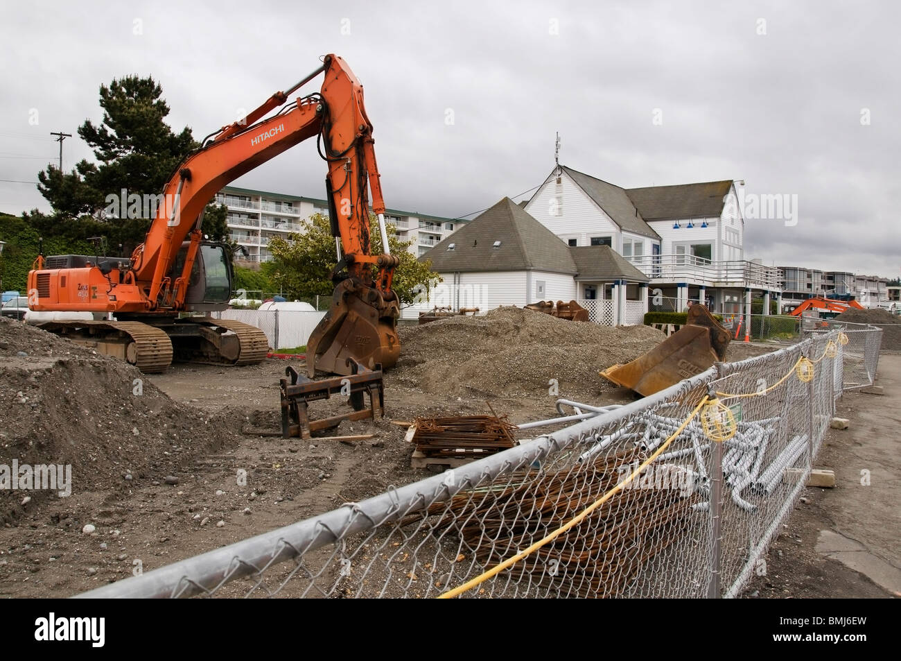 Construction site at the Des Moines Marina in Des Moines, Washington.  The marina office is visible in background. Stock Photo