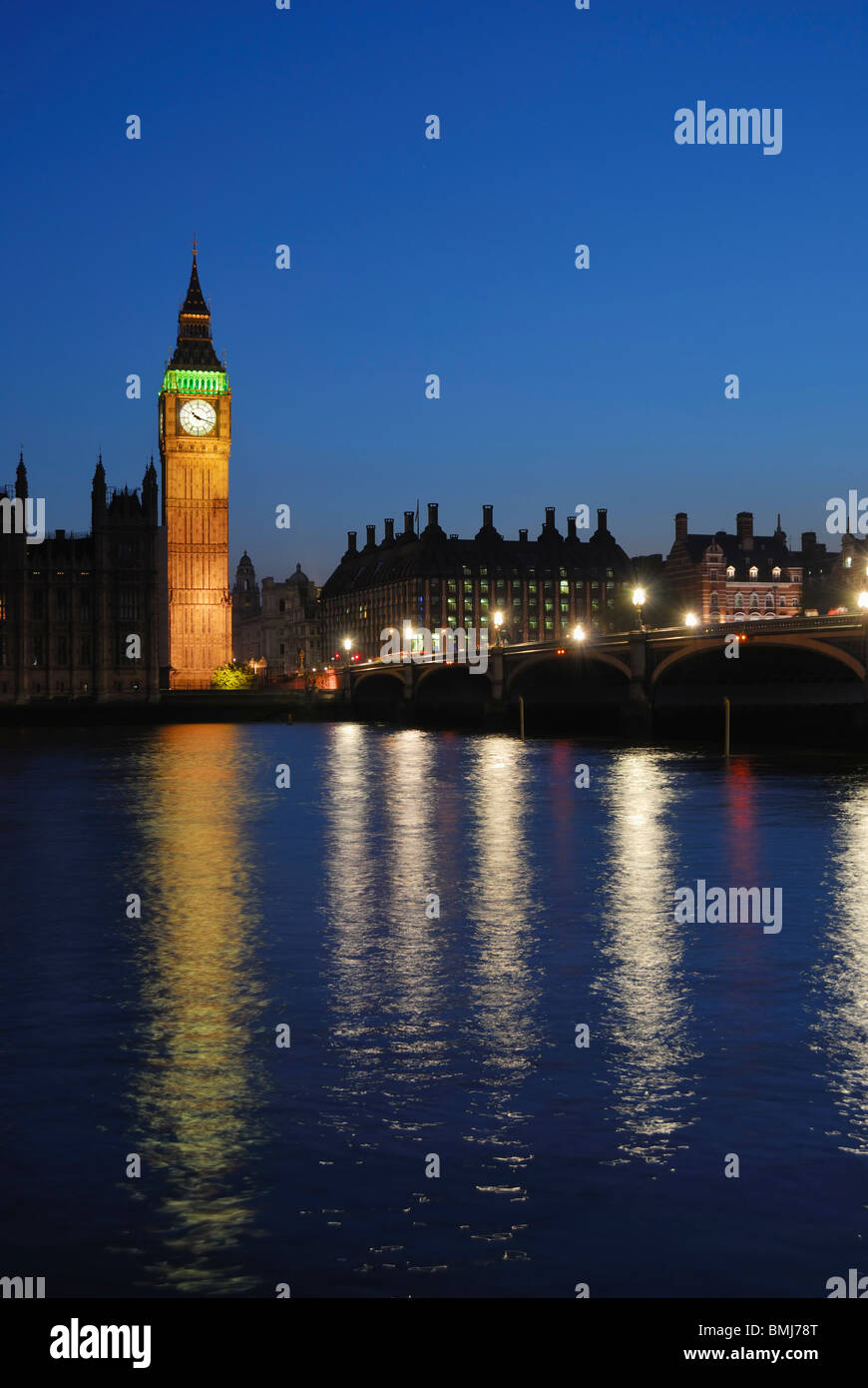 Big Ben, Westminster, London, floodlit at dusk, with Westminster Bridge Stock Photo