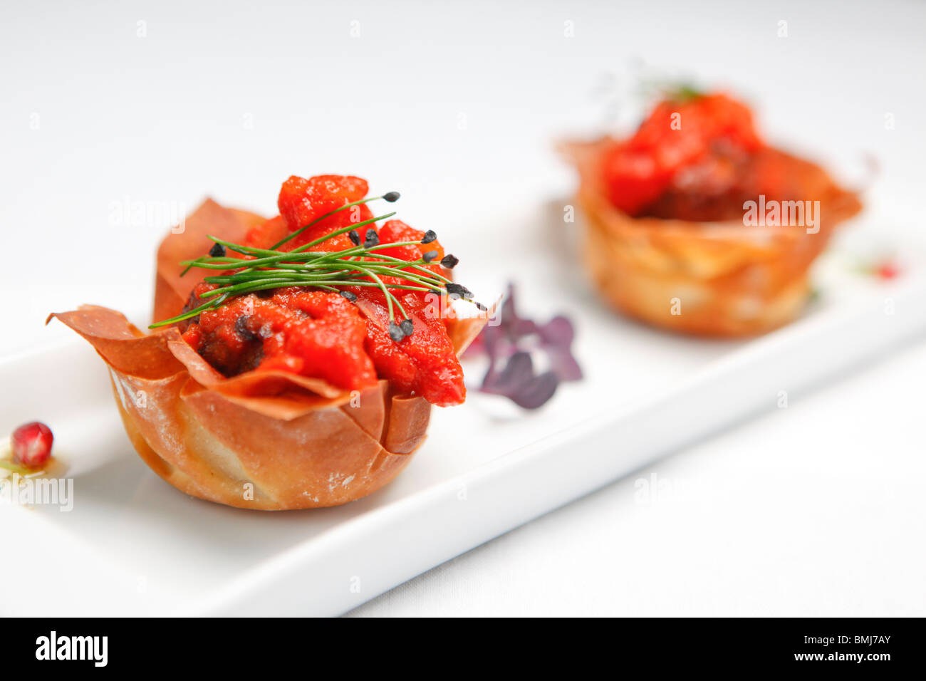 Tomato and pastry mezze food served in a restaurant Stock Photo