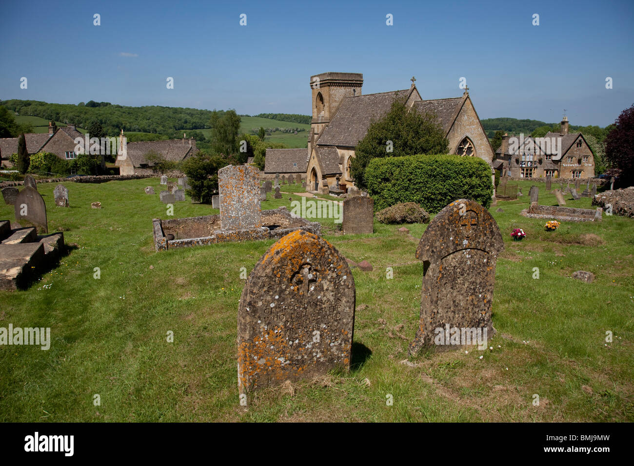 Grave stones in the church yard of the Church of St. Barnabas in Snowshill. The Cotswolds, Gloucestershire, UK. Stock Photo