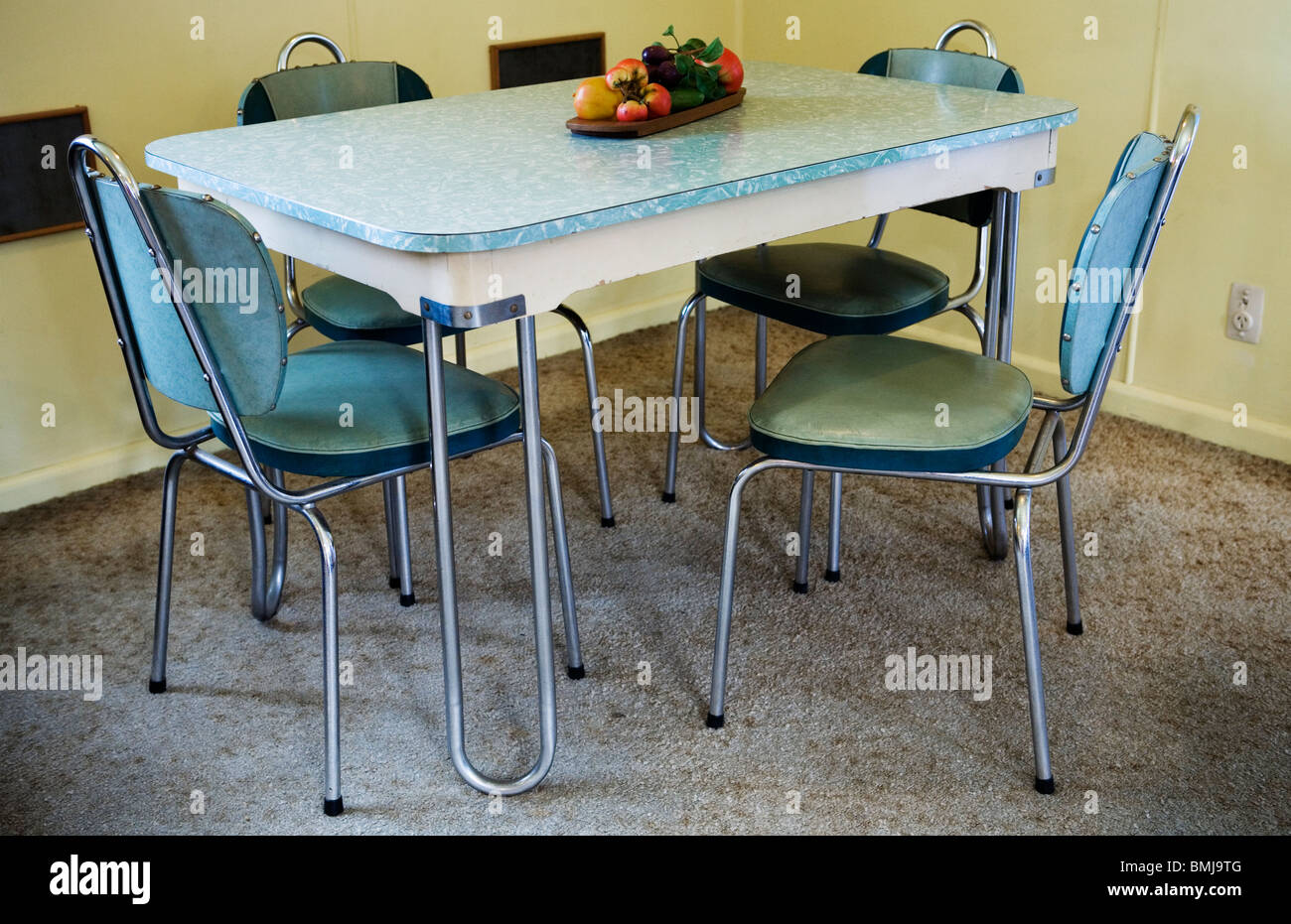 A Modern Dinner Set Table And Chairs In A Beach House From The