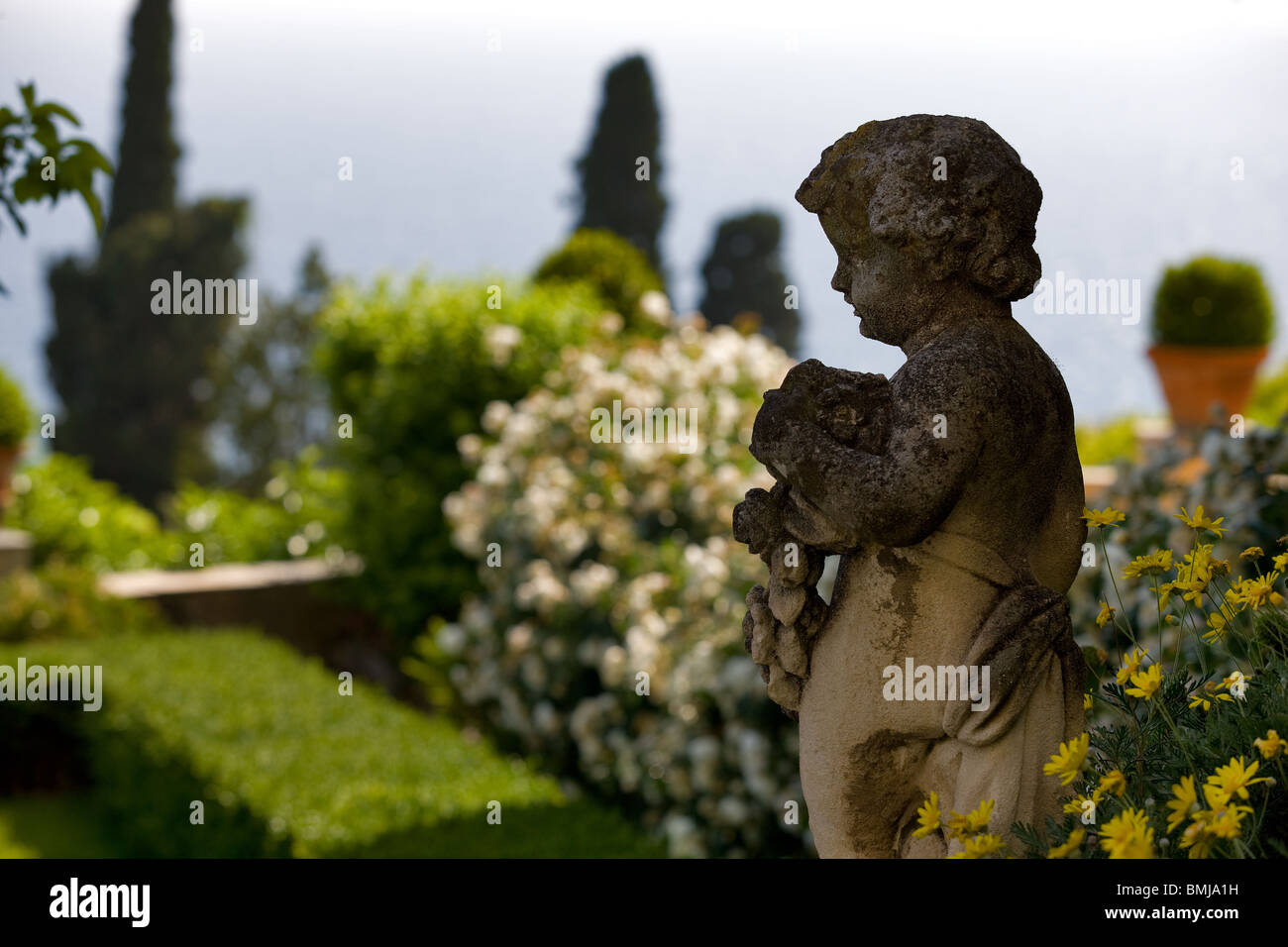 Italy, Liguria, Italian garden statue of a child Stock Photo Alamy