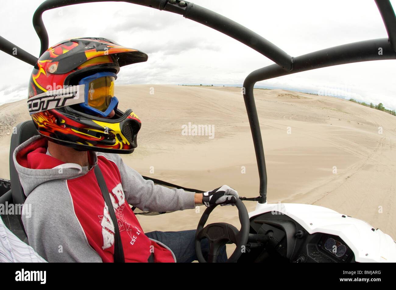 Dune buggies, quad bikes, ATCs and dirt bikes, ride through sand dunes