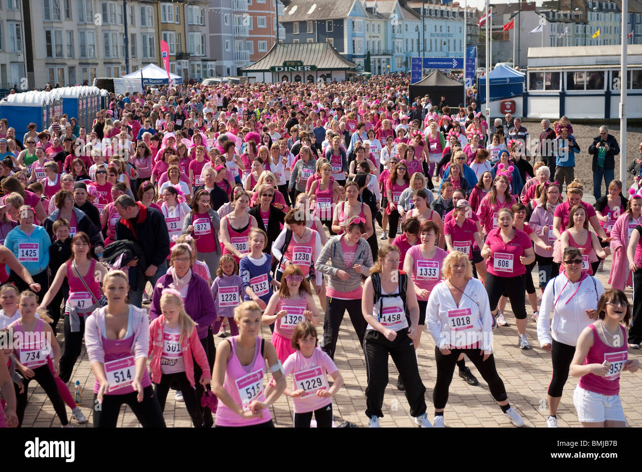 Women taking part in the annual cancer research charity fund raising RACE FOR LIFE ABERYSTWYTH MAY 16 2010 Stock Photo