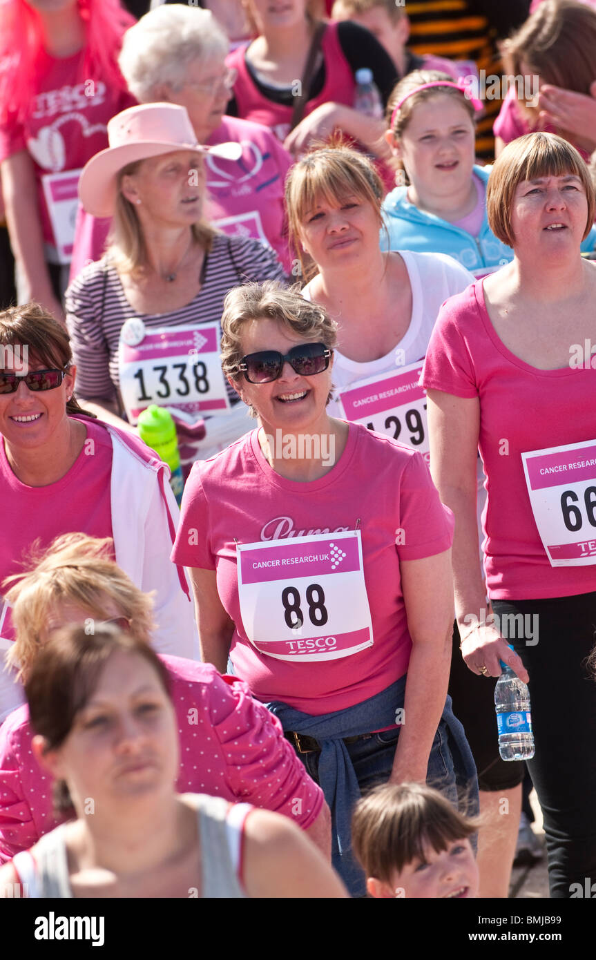 Women taking part in the annual cancer research charity fund raising RACE FOR LIFE ABERYSTWYTH MAY 16 2010 Stock Photo