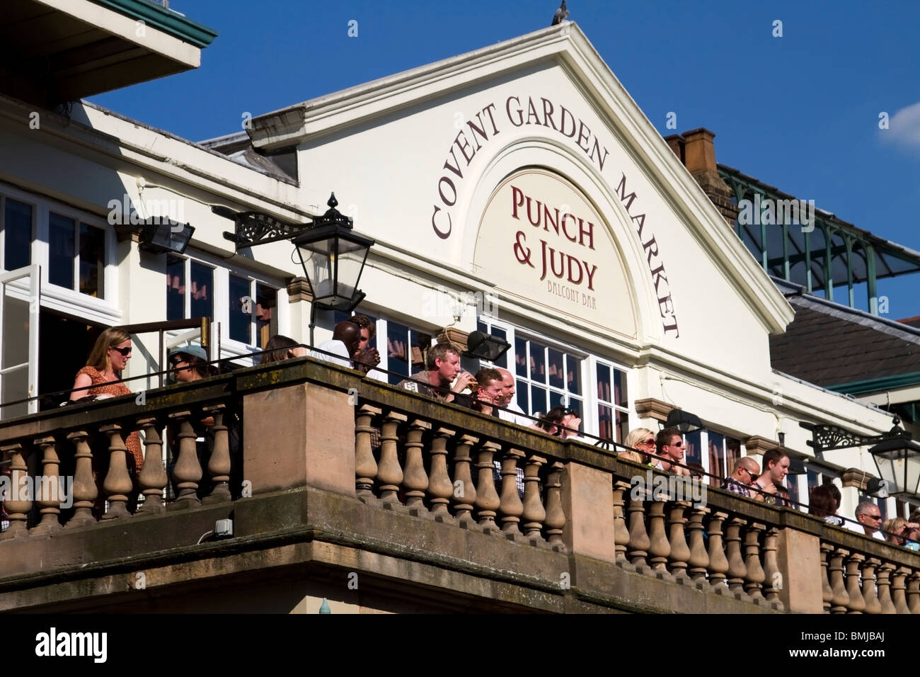 Patrons and the Punch and Judy pub in Covent Garden Market, London