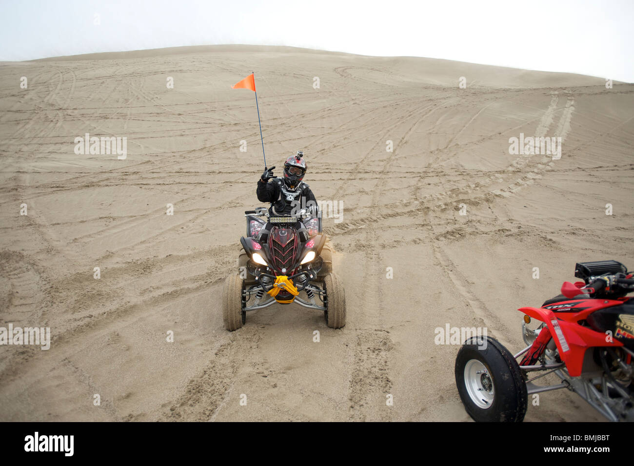 Dune buggies, quad bikes, ATCs and dirt bikes, ride through sand dunes