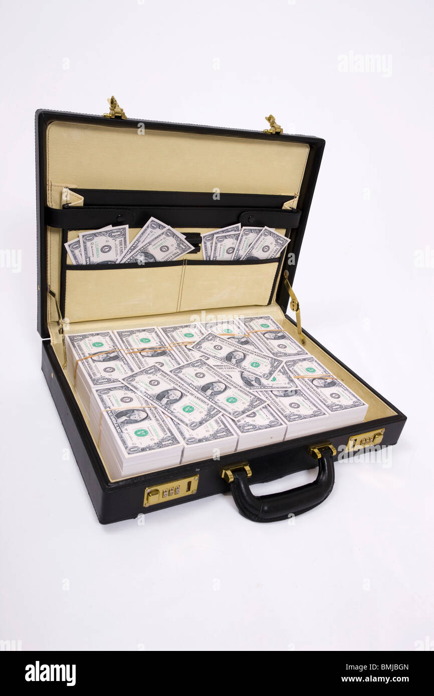Suitcase Full Of Money Stock Photo Alamy
