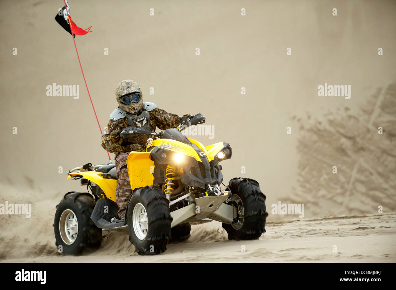 Dune buggies, quad bikes, ATCs and dirt bikes, ride through sand dunes