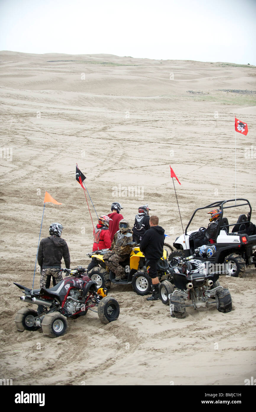 Dune buggies, quad bikes, ATCs and dirt bikes, ride through sand dunes