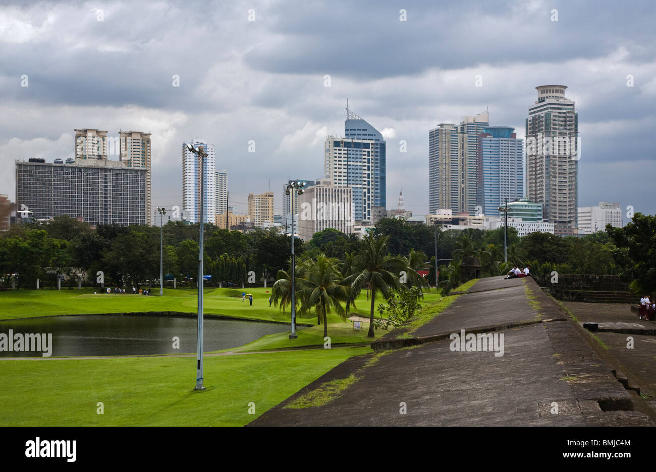 The CLUB INTRAMUROS GOLF COURSE as seen from the walls of the historical district - MANILA, PHILIPPINES Stock Photo