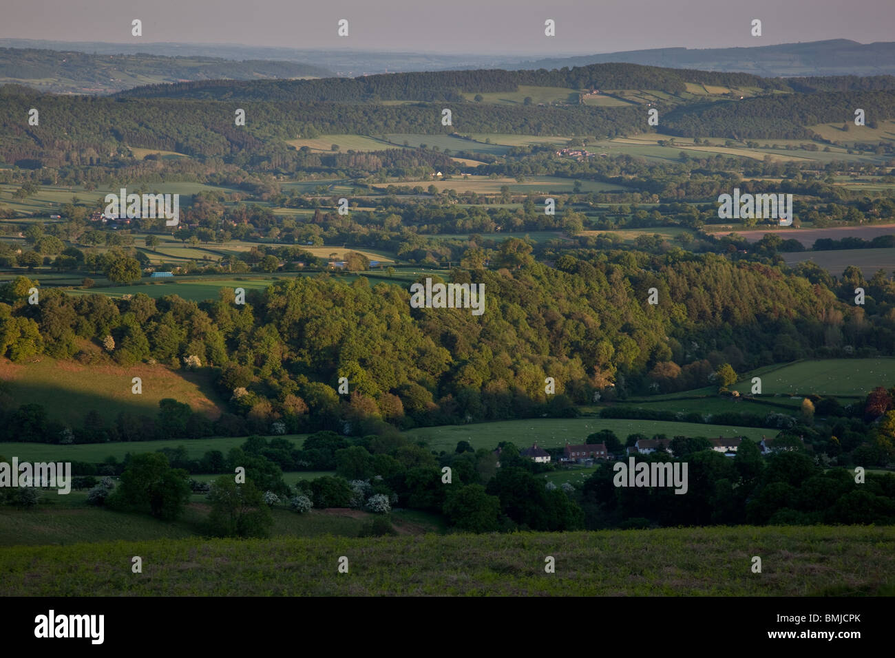 Sun set over Ape Dale and Wenlock Edge as seen from Hope Bowdler Hill near Church Stretton,Shropshire, England Stock Photo