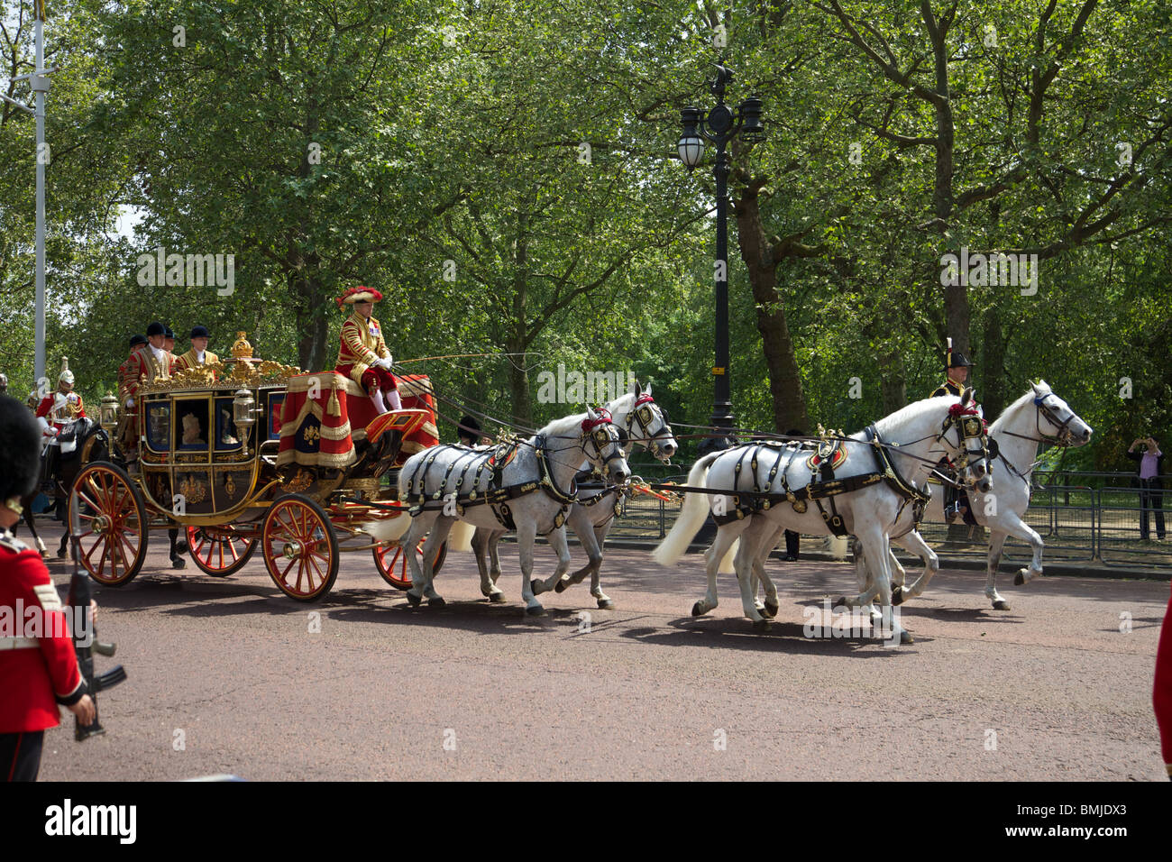 The Royal coach with Queen Elizabeth 11 and Prince Phillip on the way to the State opening of Parliament.London Stock Photo