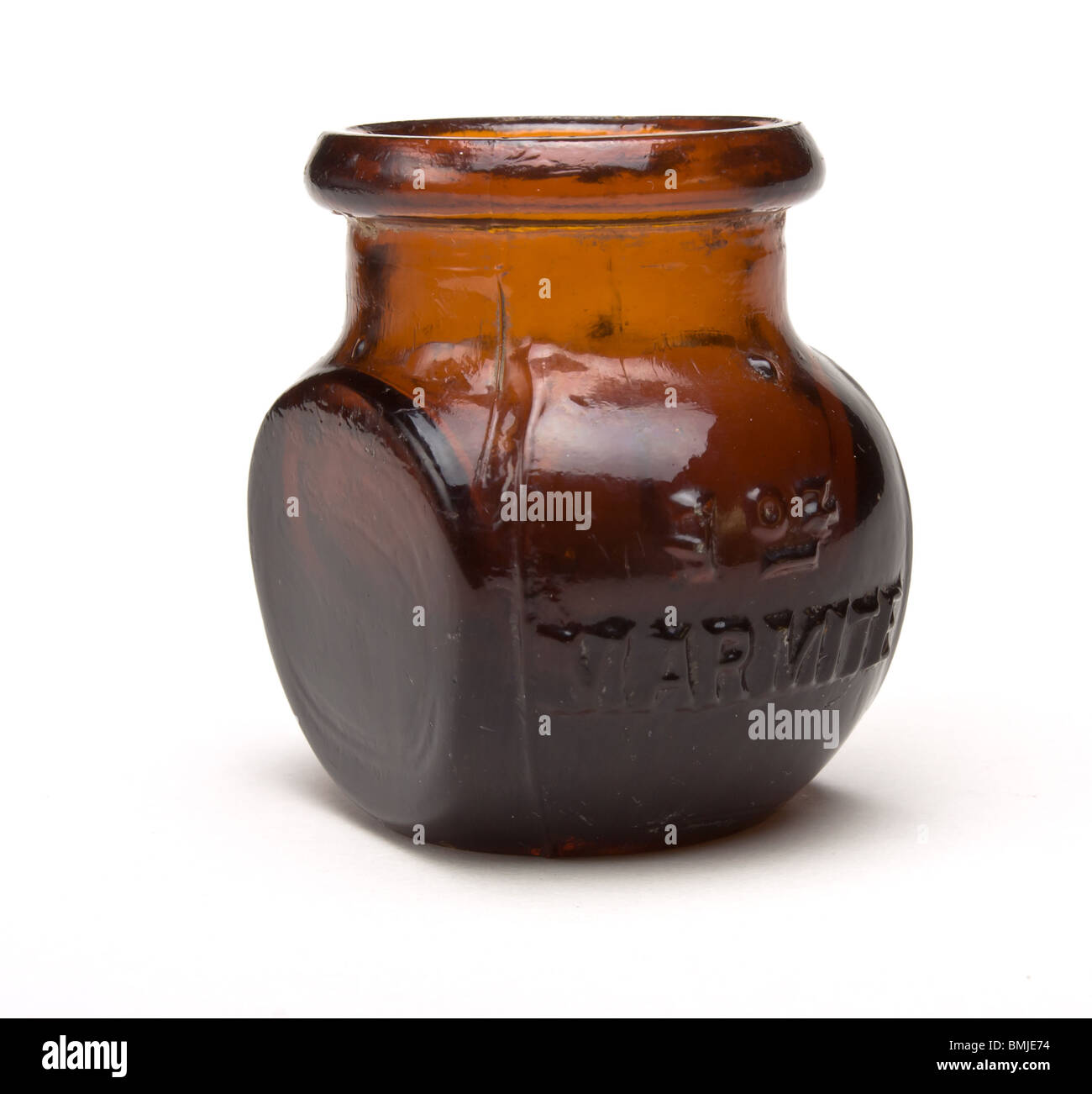 Vintage 1oz Marmite jar against white background. Stock Photo