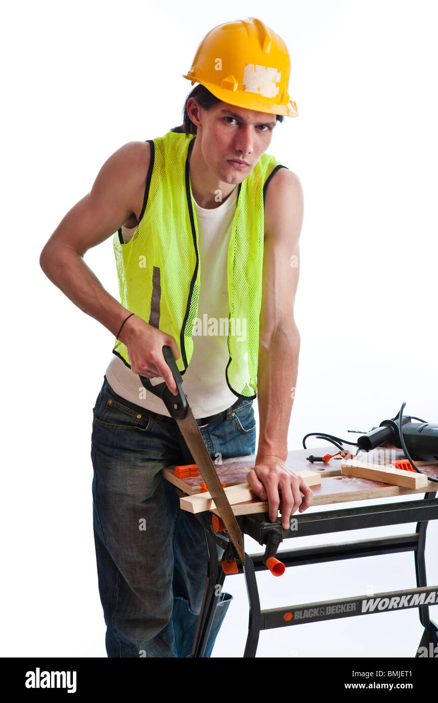 Workman with tools and a work bench Stock Photo - Alamy
