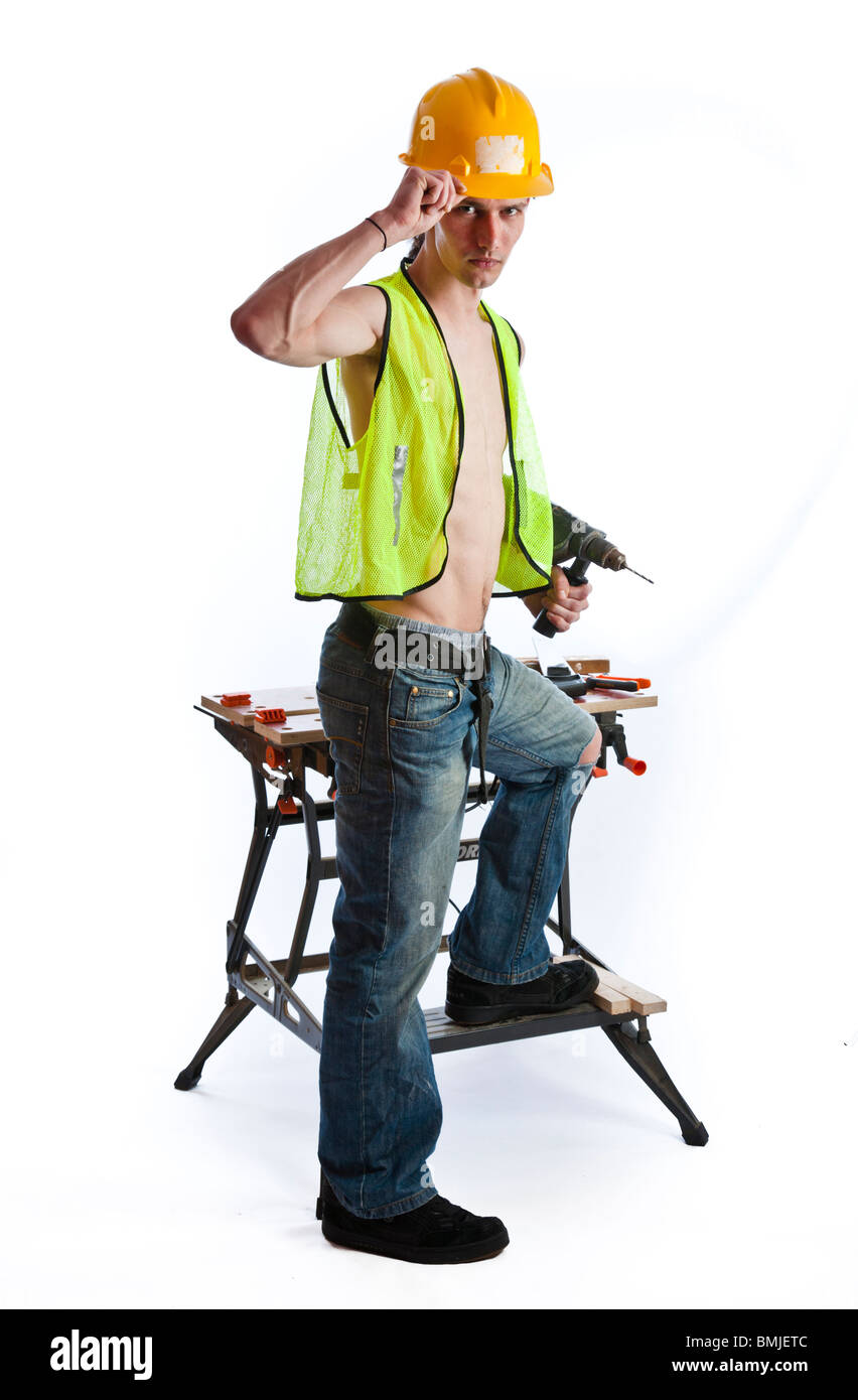 Workman with tools and a work bench Stock Photo - Alamy