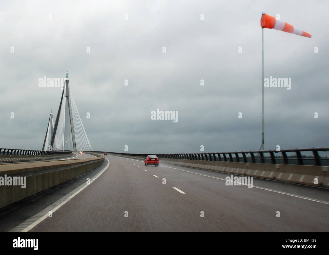 Direction of relative wind on road Stock Photo