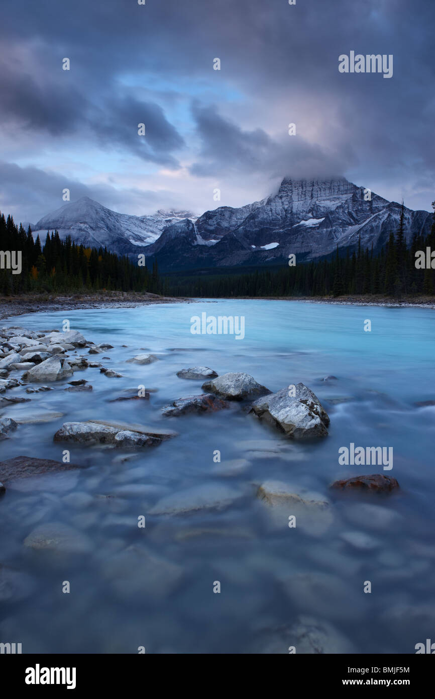 the Athabasca River with Dragon Peak and the Winston Churchill Range at dawn, Jasper National Park, Alberta, Canada Stock Photo
