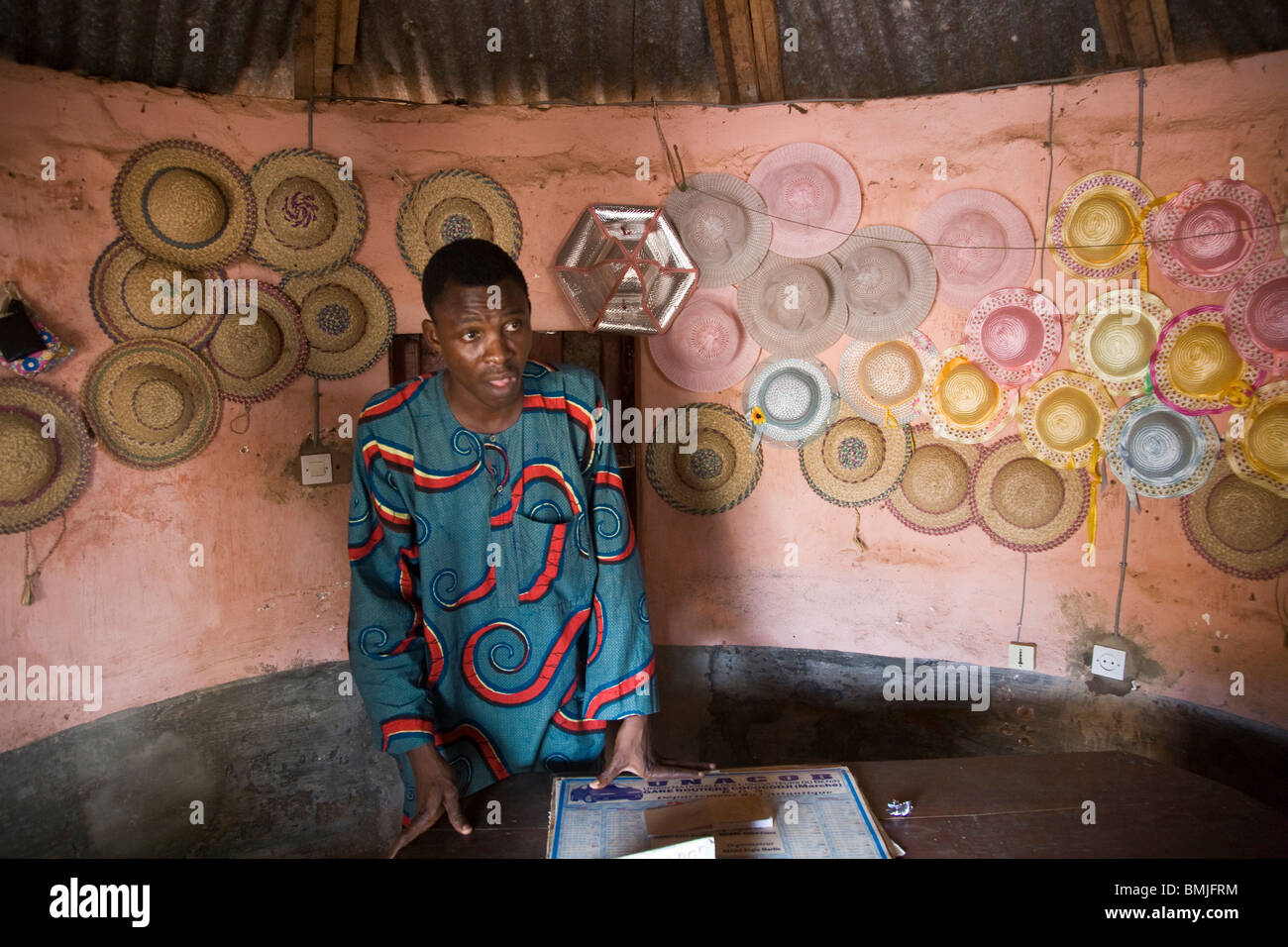 Africa, West Africa, Benin, Ouidah, Temple of the Pythons. Man at store near Temple of the Pythons in Ouidah, Benin. Stock Photo