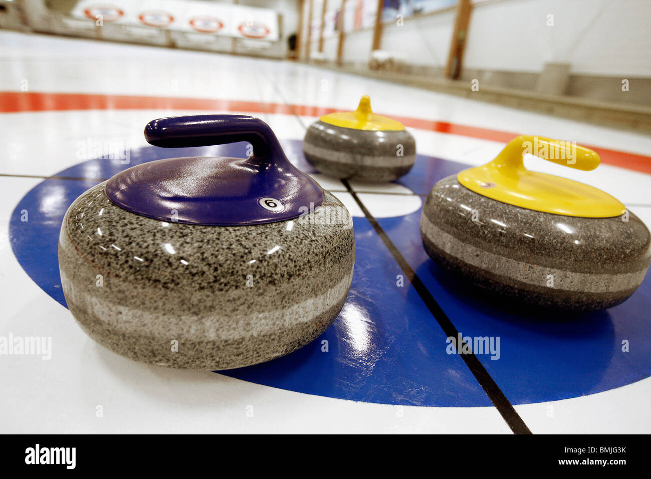 Three curling stones Stock Photo