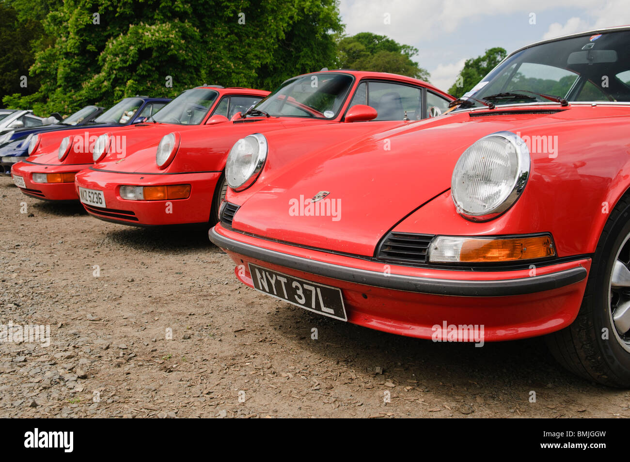 Row of red Porsche 911s Stock Photo
