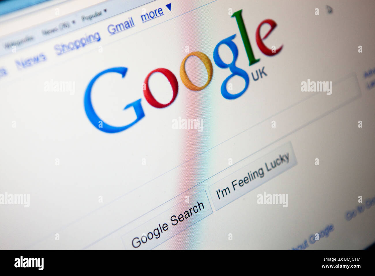Close up of a computer monitor / screen showing the Google search engine website Stock Photo