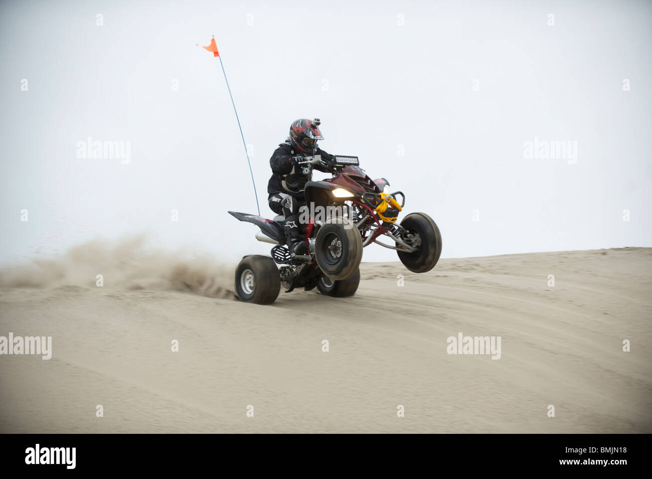 Dune buggies, quad bikes, ATCs and dirt bikes, ride through sand dunes