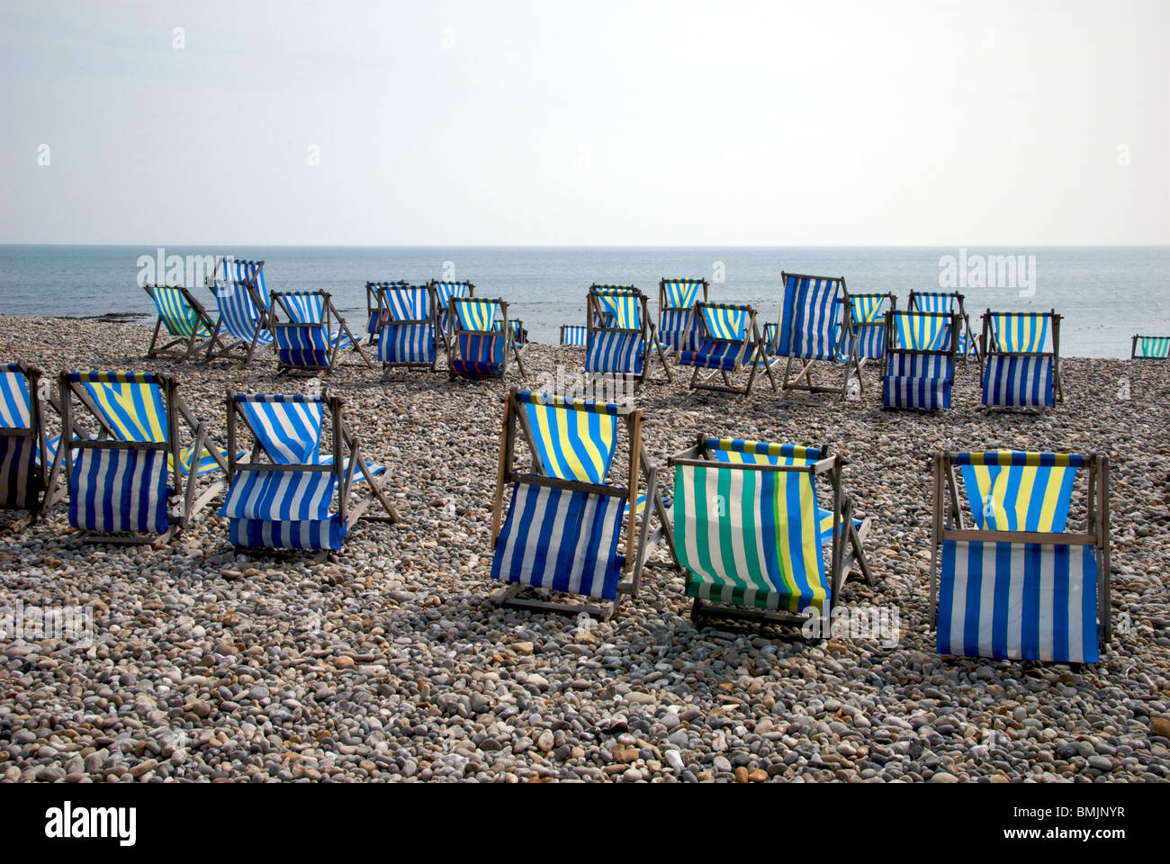 Beer Dorset UK Beach Deck Chairs Stock Photo