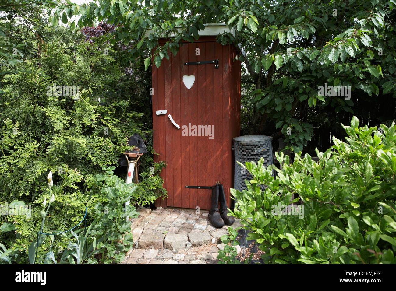 Scandinavia, Sweden, Halland, Falkenberg, View of toilet in garden Stock Photo