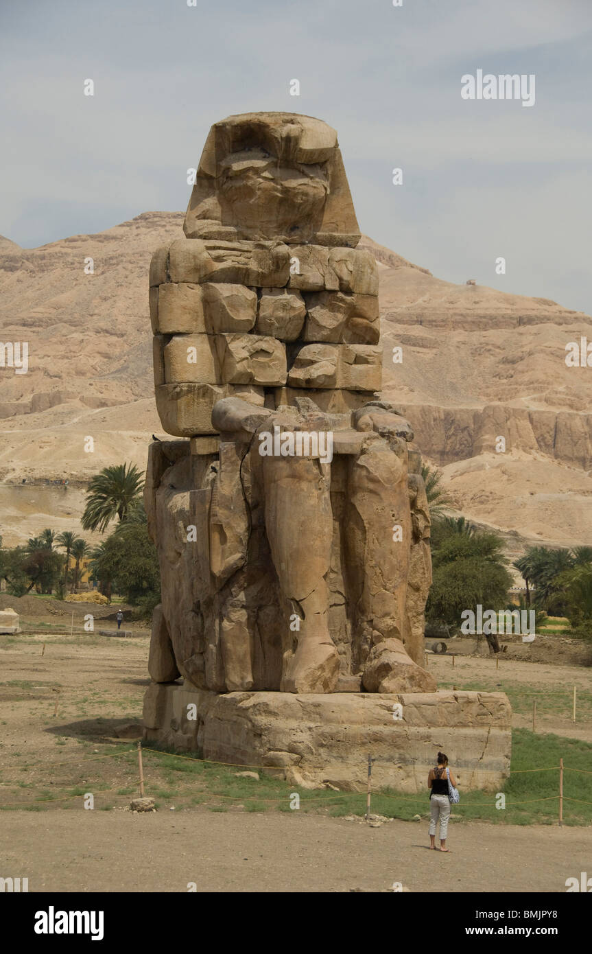 Egypt, Luxor, West Bank, Colossi of Memnon. Giant stone statues of