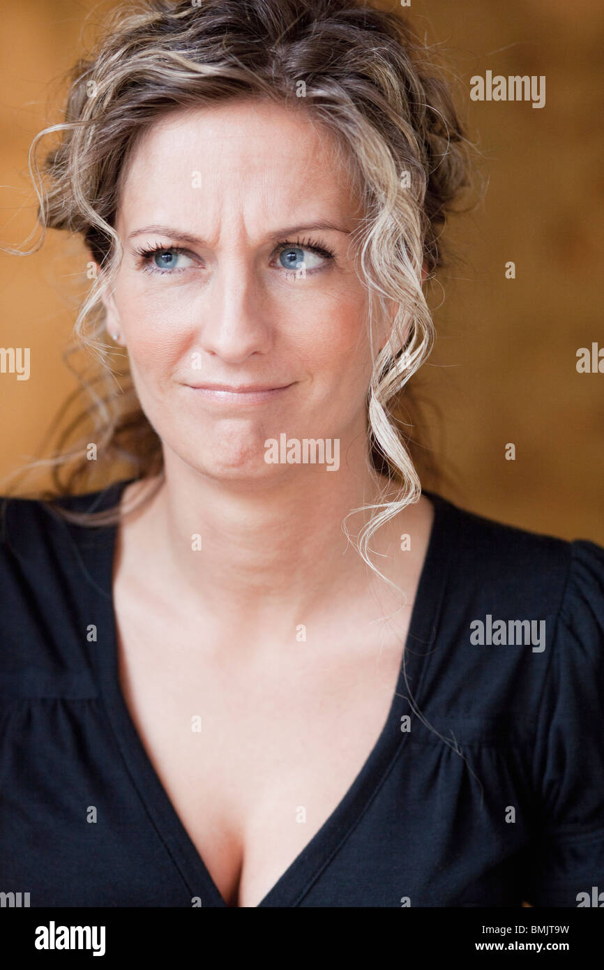 Woman pulling a face Stock Photo