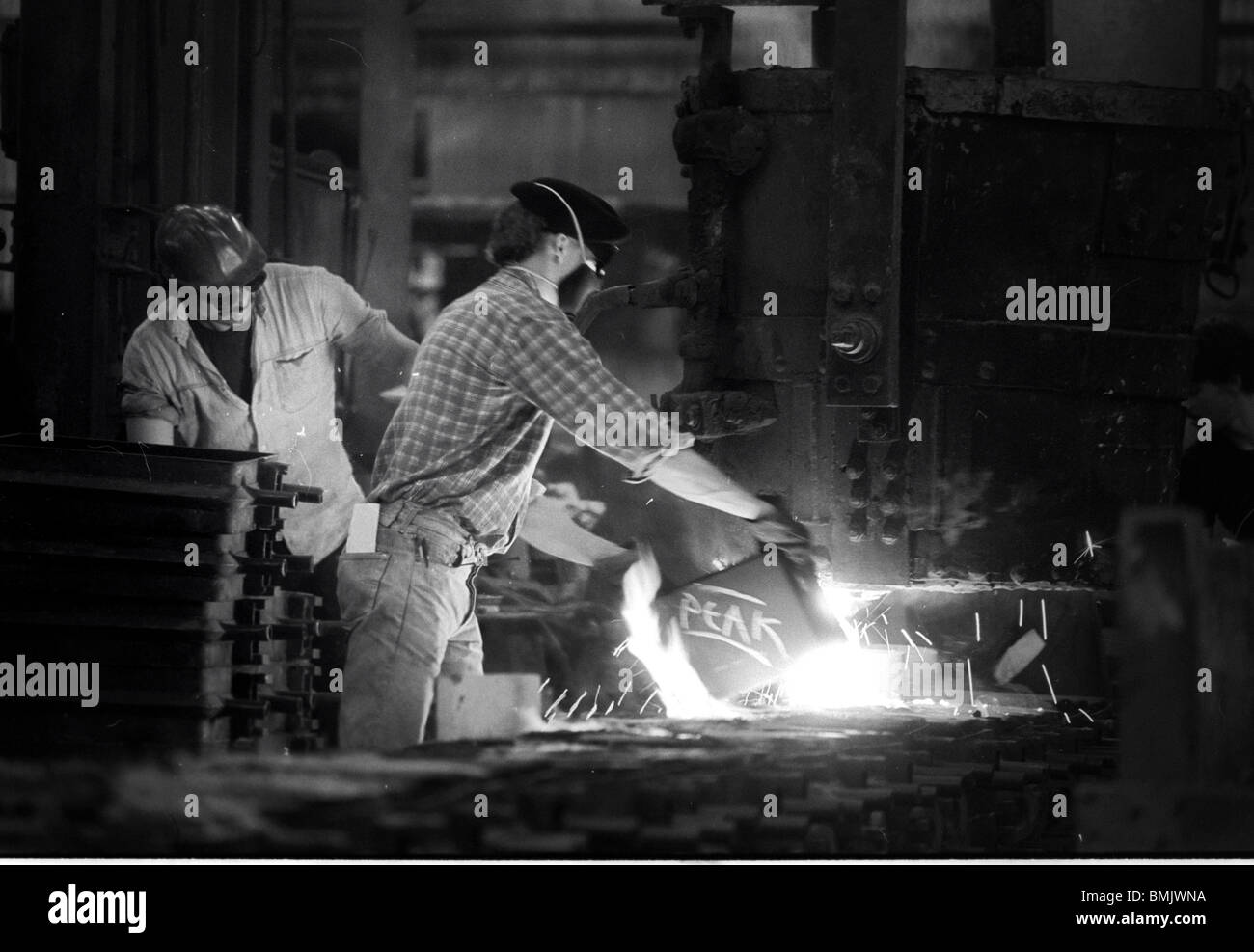 Worker in iron foundry, Wednesfield, West Midlands, England, UK Stock