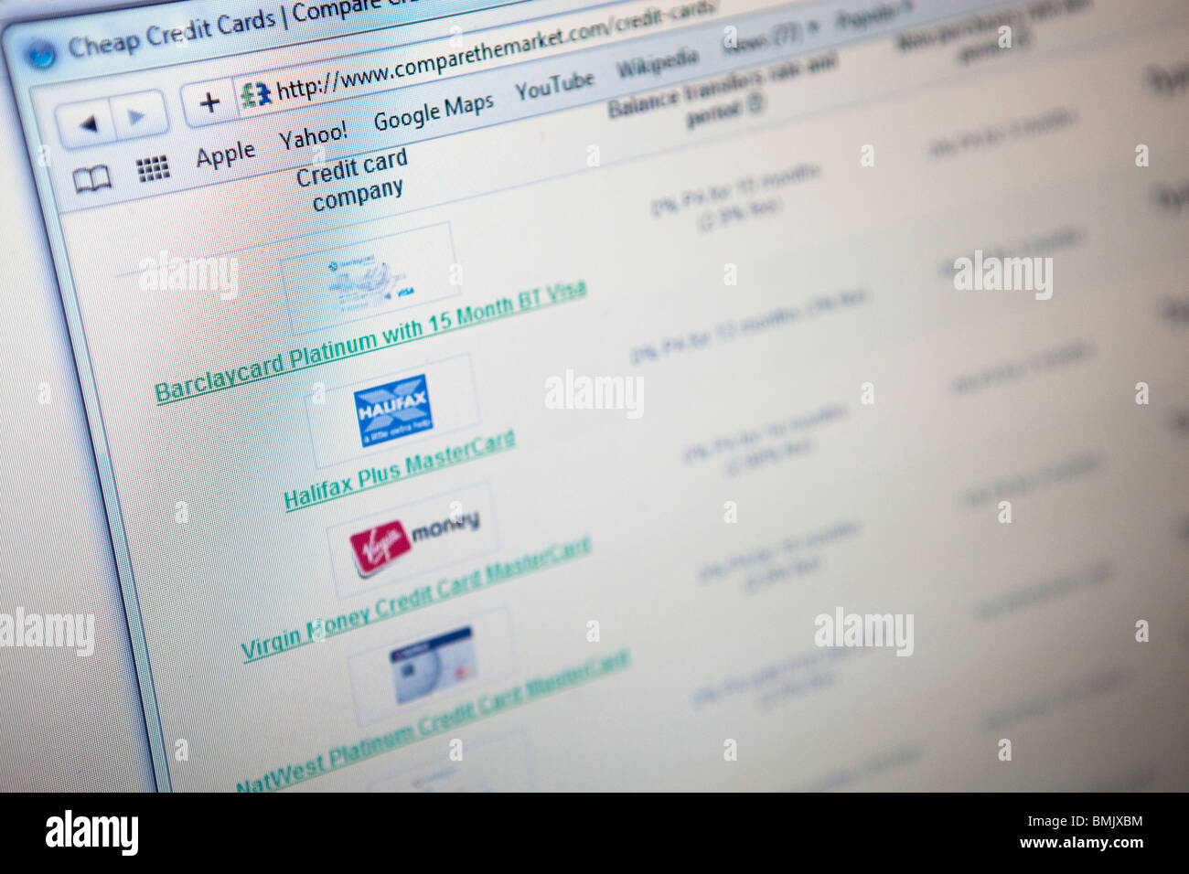 Close up of a computer monitor / screen showing different options for credit cards and loans for borrowing money Stock Photo