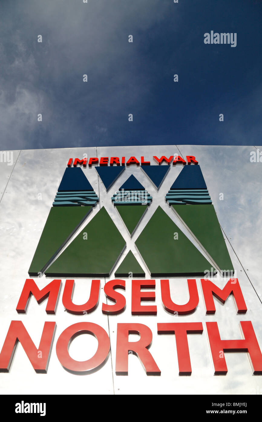 The logo and entrance sign at The Imperial War Museum North, The Quays, Salford, Manchester, UK. Stock Photo
