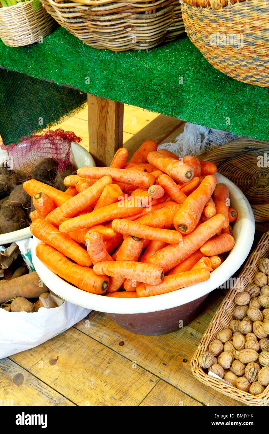 Carrots for sale in a local organic food shop, London. Organic grocer. Stock Photo