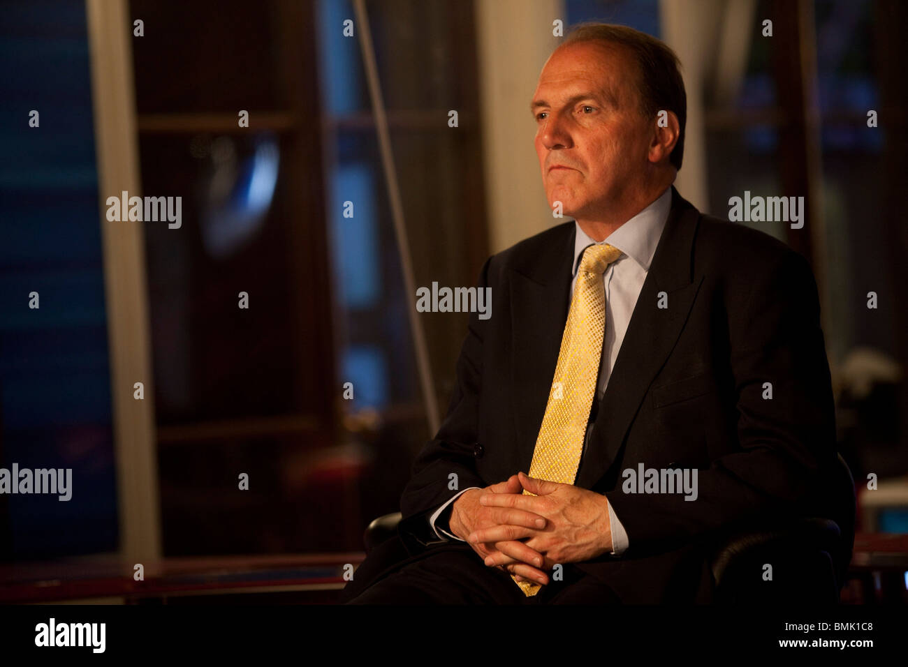 Simon Hughes, MP for Bermondsey and Old Southwark watches as the exit poll is released for the 2010 General Election. Stock Photo