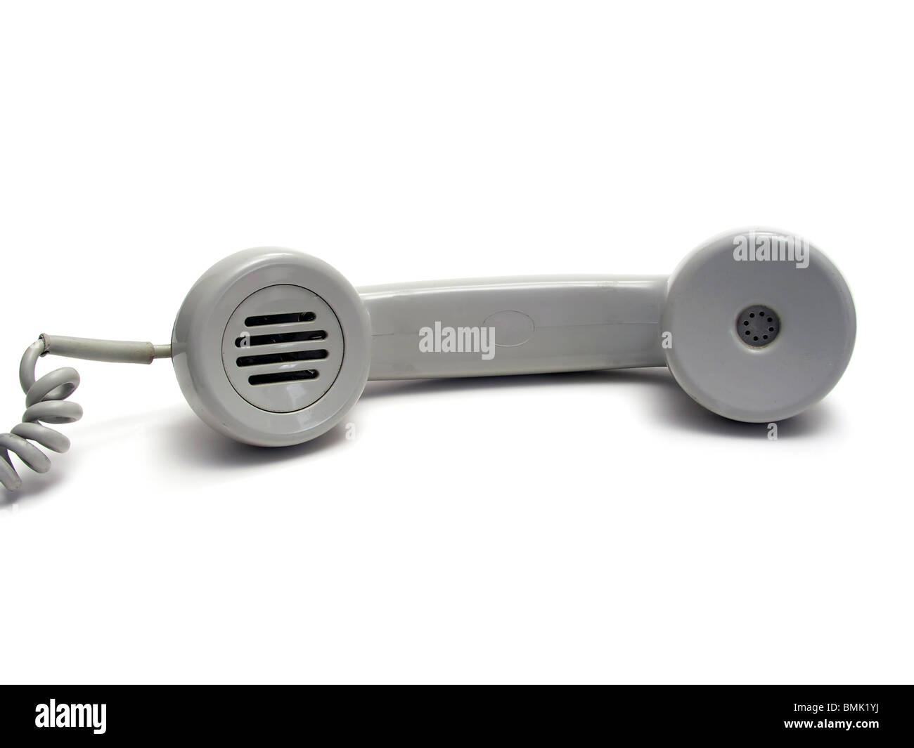 Old gray telephone receiver isolated on white background Stock Photo Alamy
