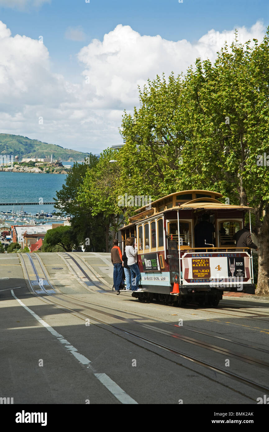 Passengers Clinging onto Powell and Hyde Street Tram, San Francisco, California, USA Stock Photo