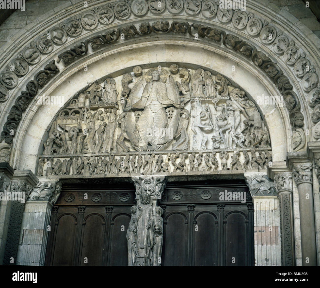 Autun Cathdreal, France. Romanesque tympanum over west door showing Christ in judgement. Stock Photo