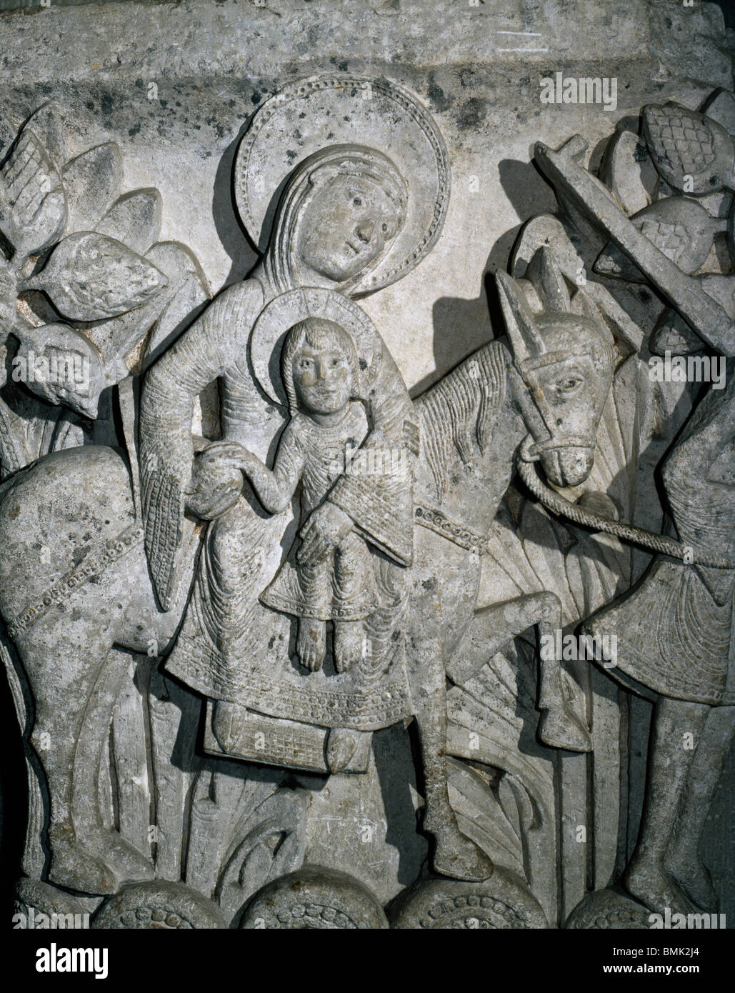 Autun Cathedral, France. Romanesque capital showing the Flight into Egypt, with Mary and baby Jesus on the back of a donkey. Stock Photo