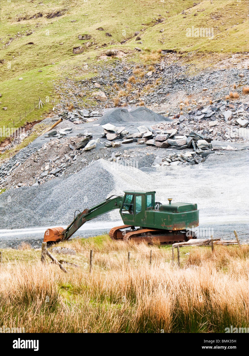 Digger at the Honister Pass Slate Mine The Lake District England UK Stock Photo