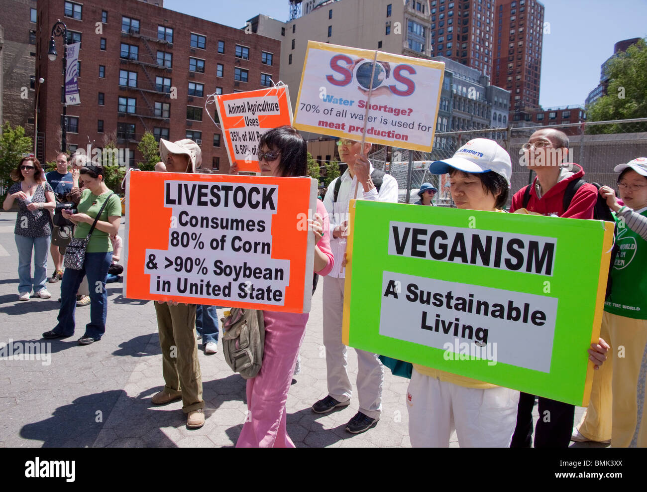 Vegetarian & vegan supporters display signs at the Veggie Pride Parade & Rally in Union Square, New York City, NY. Stock Photo