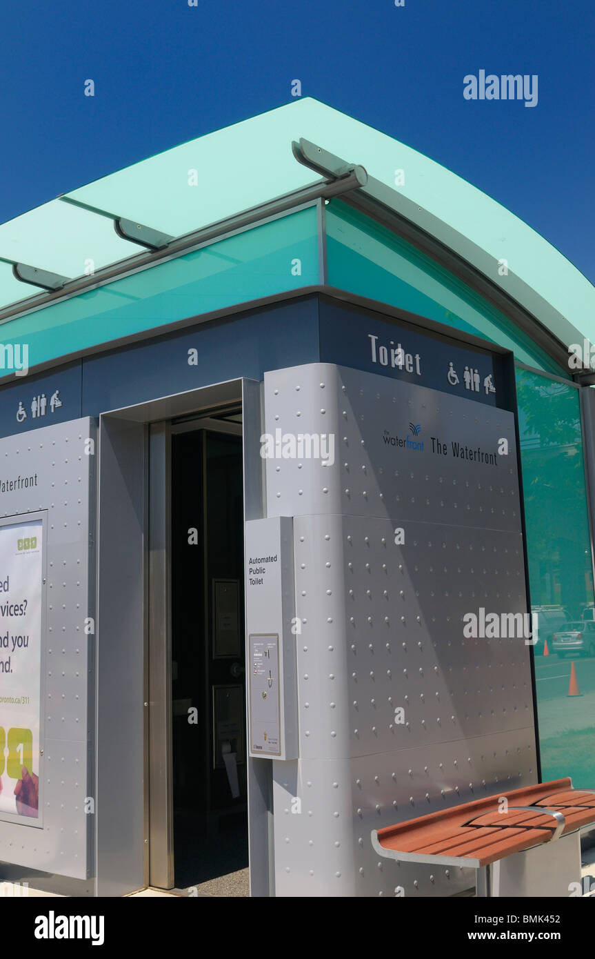 Steel door opening on first automated public pay toilet on the Toronto